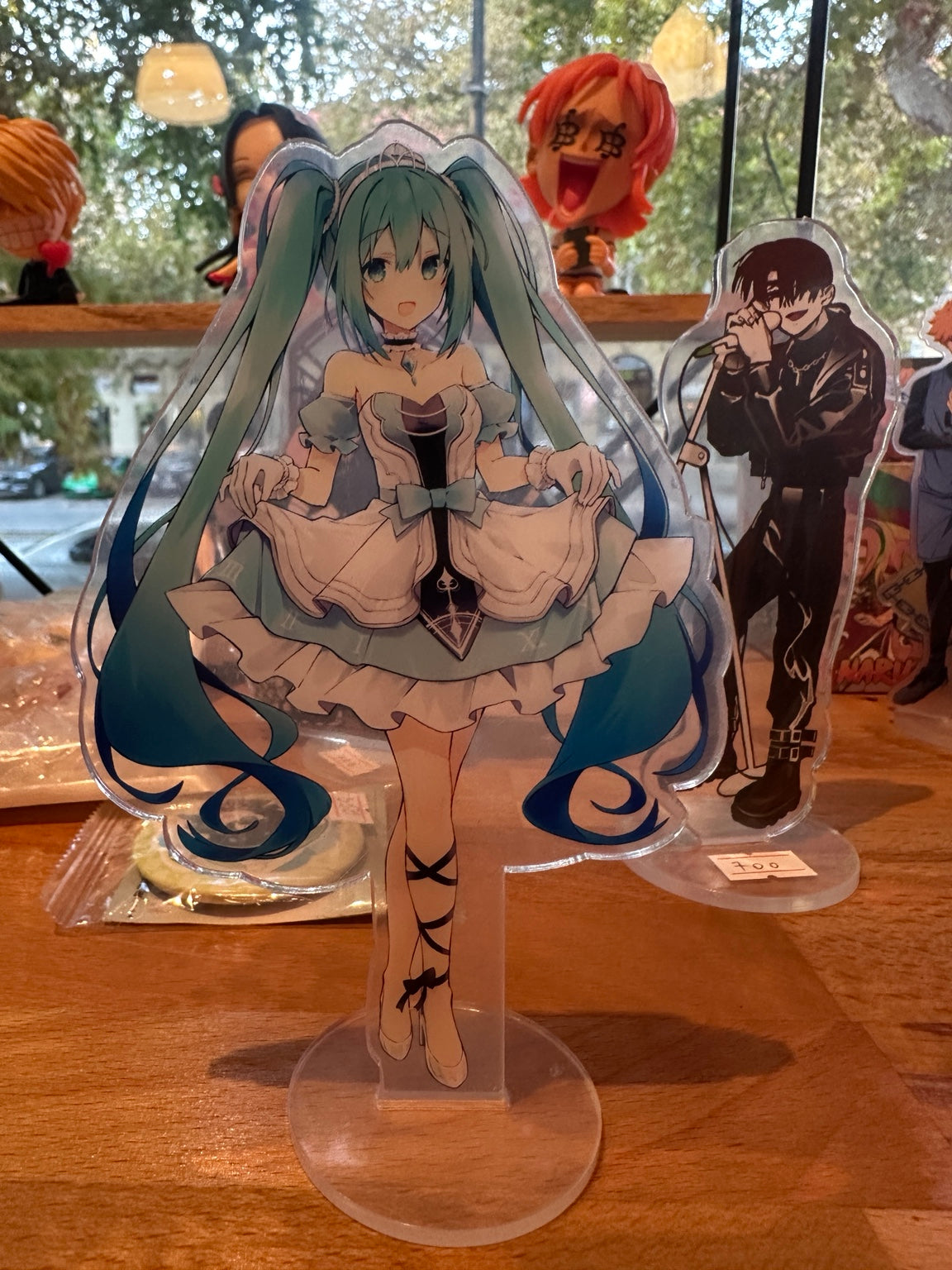 Hatsune Miku acrylic stand in blue and white dress, front view