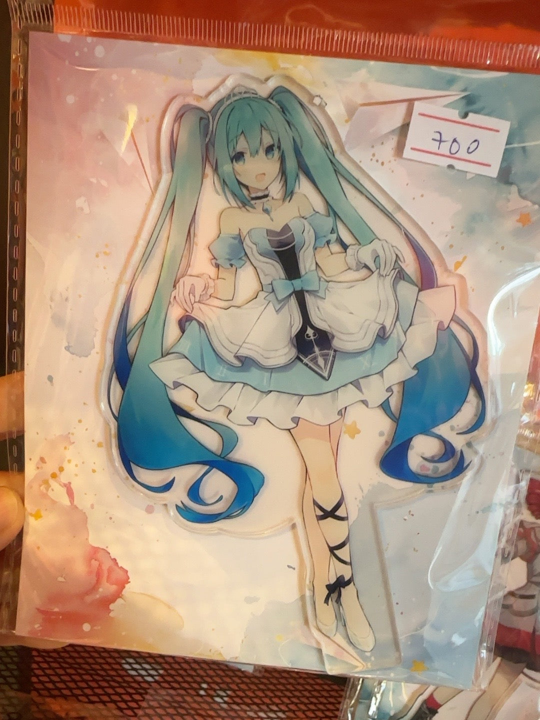 Hatsune Miku acrylic stand photographed in packaging