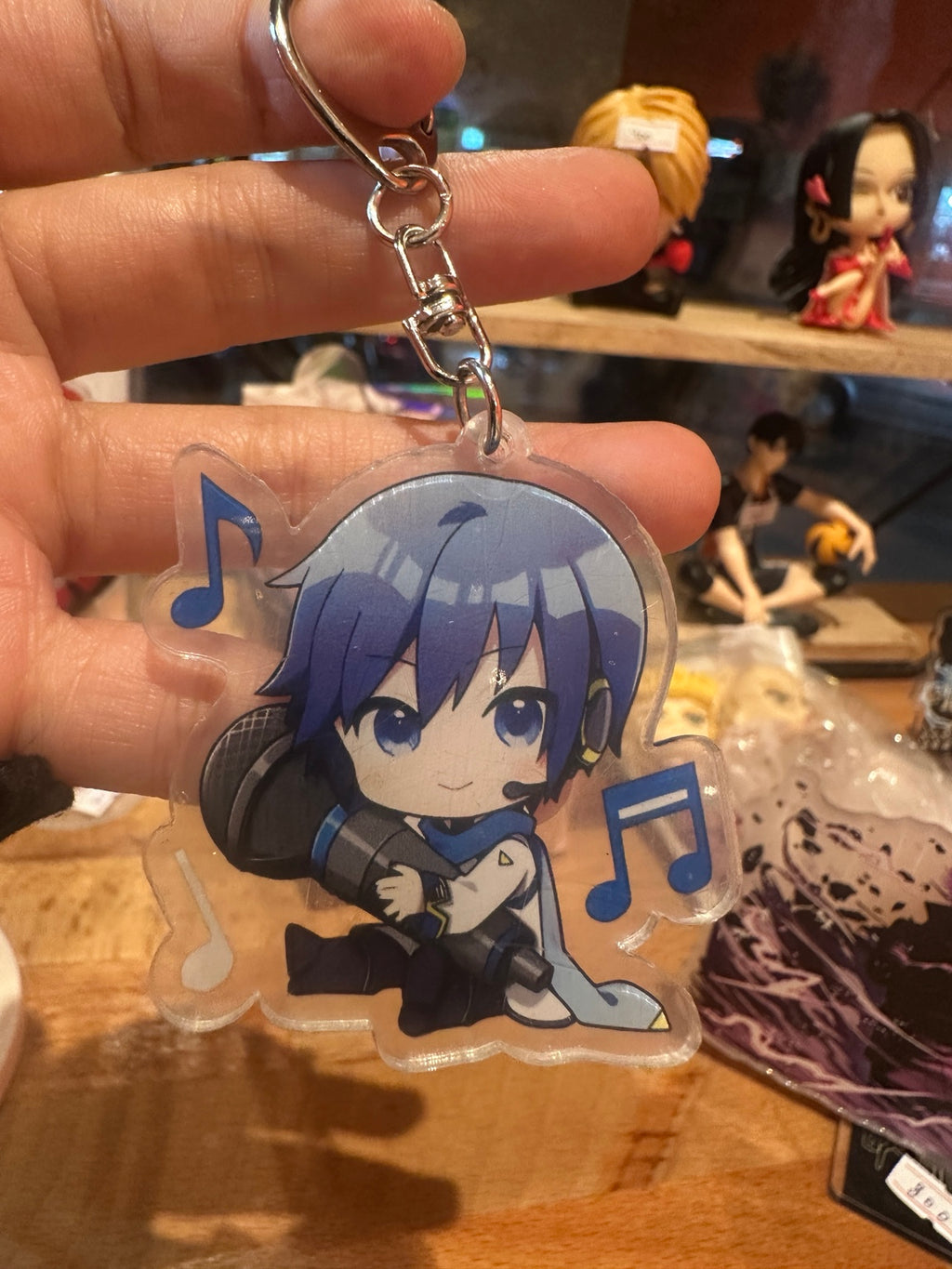 KAITO acrylic keychain hanging from metal clasp