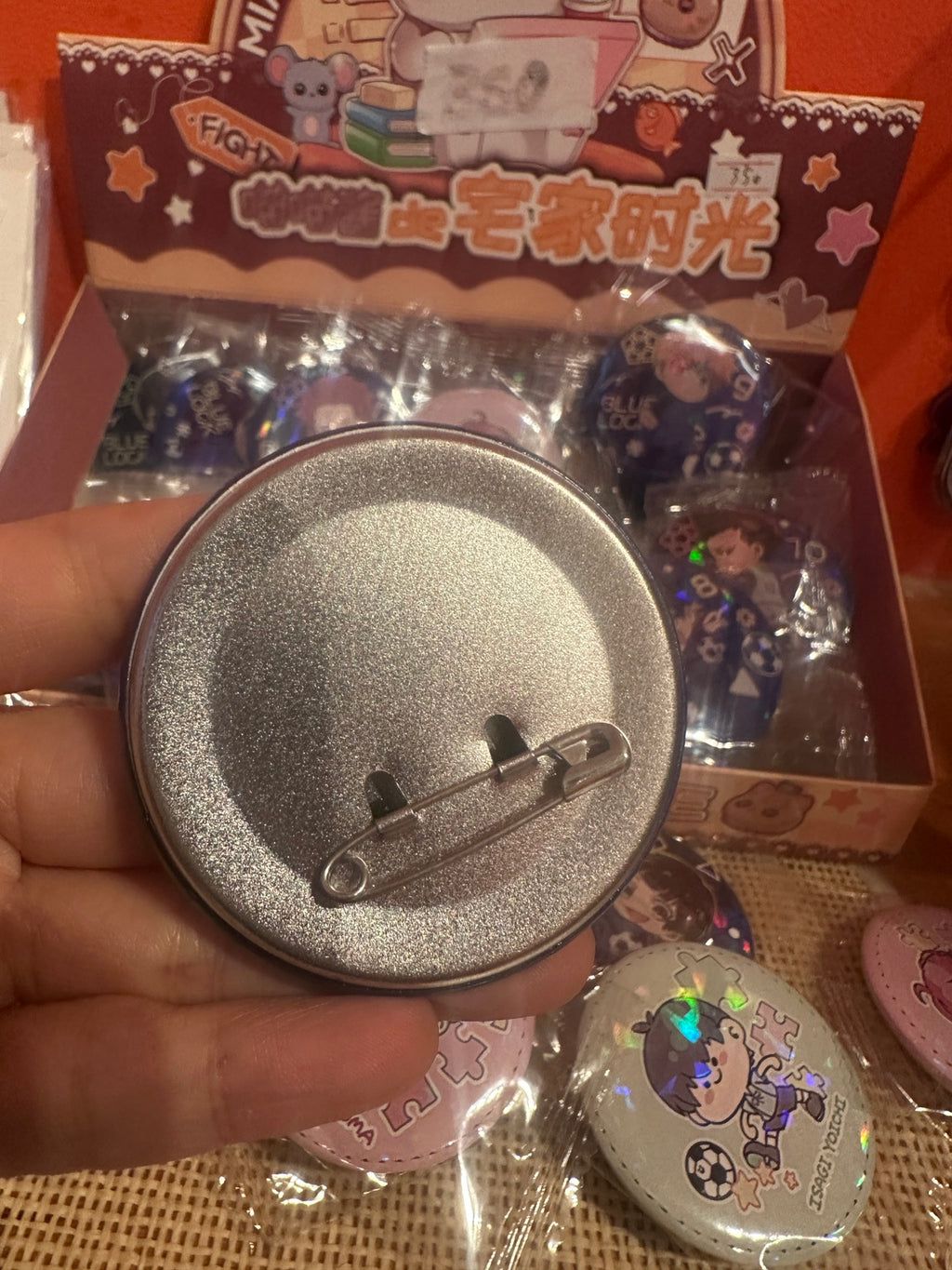 Metal pin back of Blue Lock holographic badge
