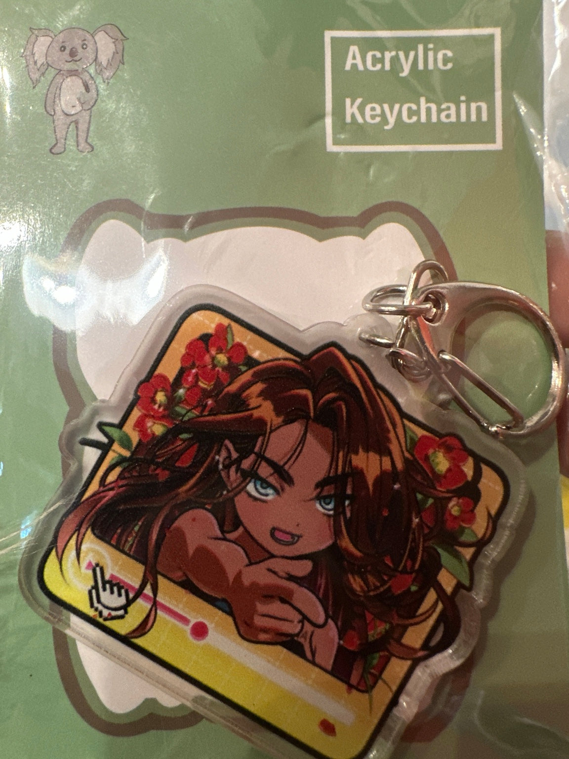 Long brown hair anime character with red flowers acrylic keychain