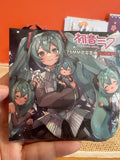 Hatsune Miku 75mm badge blind pack series display box - real in-store photo
