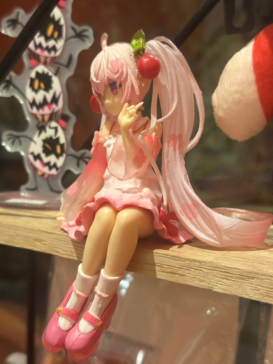 ANF-074 | Pink Cherry Blossom Anime Girl Sitting Figure – Shelf Edge