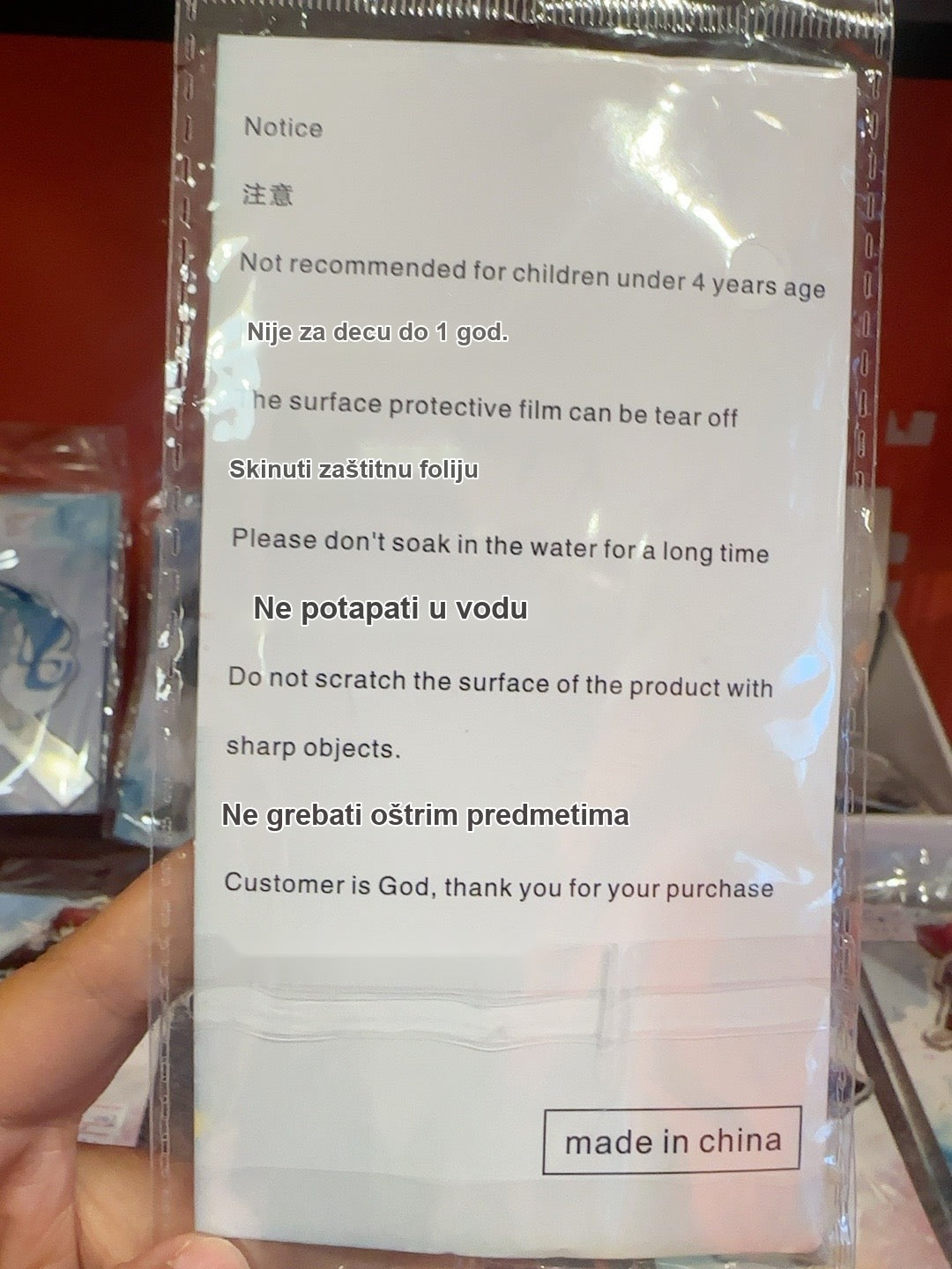 Back of acrylic stand package showing safety and care instructions
